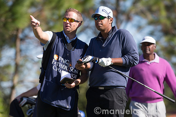 Qass and Vijay Singh with caddie