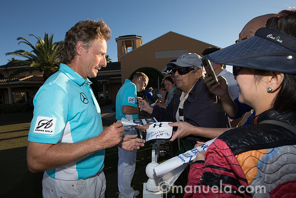 Bernhard and Jason Langer signing autographs