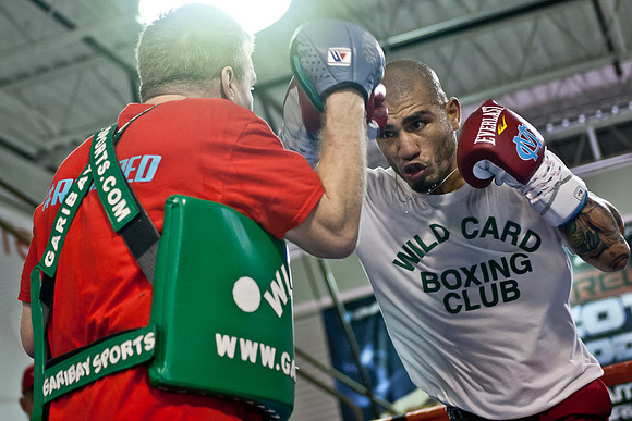 Miguel Cotto and trainer Freddie Roach