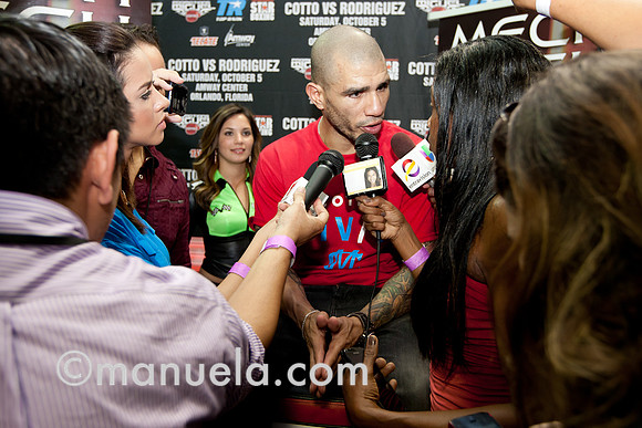 Miguel Cotto talks to the media at the Don Miguel Boxing Gym in Orlando