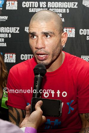 Miguel Cotto talks to the media at the Don Miguel Boxing Gym in Orlando