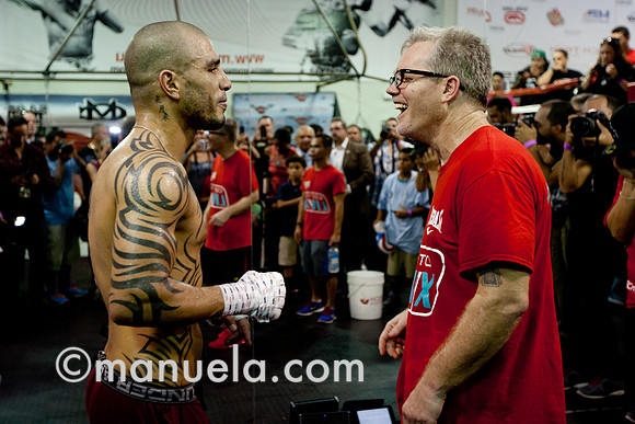 Miguel Cotto and trainer Freddie Roach prepare for the fight against Delvin Rodriguez on Oct 5