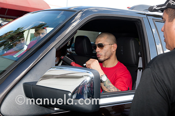 Miguel Cotto signs one last autograph before leaving the Don Miguel Boxing Gym in Orlando