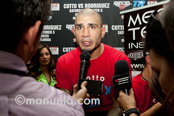 Miguel Cotto talks to the media at the Don Miguel Boxing Gym in Orlando