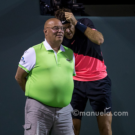 Juan Martin Del Potro (ARG) joking with line umpire