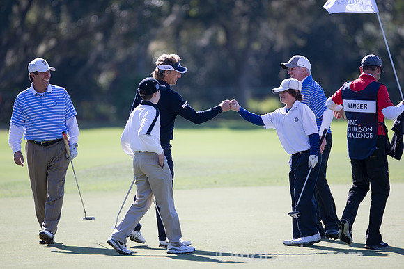 Amateurs Shea and Tilas playing with Bernhard Langer