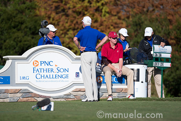 Davis (Dru) Love IV takes a break on the 18th tee