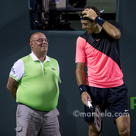 Juan Martin Del Potro (ARG) joking with line umpire