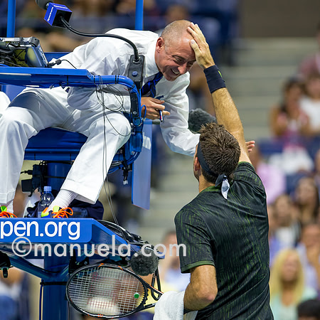 Umpire Pascal Maria and Juan Martin Del Potro (ARG)